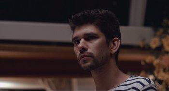 Movie still from “The Lobster” (2015), directed by Yorgos Lanthimos – A person wearing a striped shirt; Close Up shot, Low angle