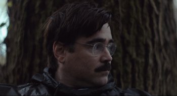 Movie still from “The Lobster” (2015), directed by Yorgos Lanthimos – A person wearing glasses and a mustache; Close Up shot, Low angle