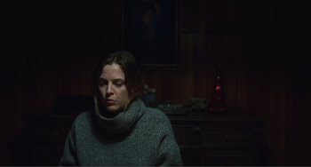 Movie still from “The Lodge” (2019), directed by Severin Fiala – Medium shot, Low angle