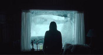 Movie still from “The Lodge” (2019), directed by Severin Fiala – Medium shot, Low angle