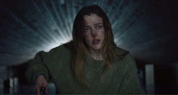 Movie still from “The Lodge” (2019), directed by Severin Fiala – Medium shot, Low angle