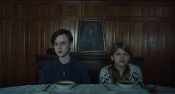 Movie still from “The Lodge” (2019), directed by Severin Fiala – Medium shot, High angle