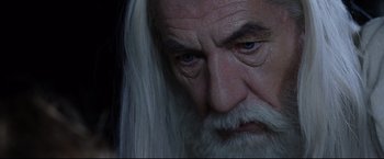 Movie still from “The Lord of the Rings: The Return of the King” (2003), directed by Peter Jackson – An old man with long white hair and blue eyes; Close Up shot, High angle