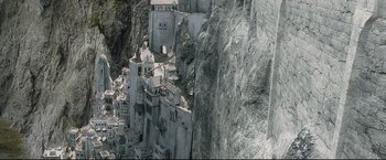 Movie still from “The Lord of the Rings: The Return of the King” (2003), directed by Peter Jackson – A view of a mountain from a distance; Extreme Wide shot, High angle