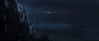 Movie still from “The Lord of the Rings: The Return of the King” (2003), directed by Peter Jackson – A view of a city at night from a hill; Extreme Wide shot, High angle