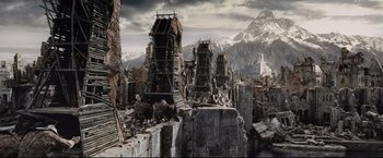 Movie still from “The Lord of the Rings: The Return of the King” (2003), directed by Peter Jackson – An image of an old building in the middle of a city; Extreme Wide shot, High angle