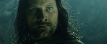 Movie still from “The Lord of the Rings: The Return of the King” (2003), directed by Peter Jackson – A person with long hair; Close Up shot, Low angle