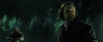 Movie still from “The Lord of the Rings: The Return of the King” (2003), directed by Peter Jackson – Aragorn in a cave; Medium shot, Low angle