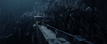 Movie still from “The Lord of the Rings: The Return of the King” (2003), directed by Peter Jackson – A view of a city from the top of a hill; Extreme Wide shot, High angle