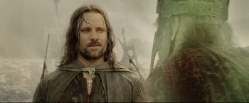 Movie still from “The Lord of the Rings: The Return of the King” (2003), directed by Peter Jackson – A picture of aragorn from the lord of the rings; Close Up shot, Over the shoulder angle