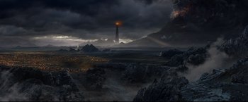 Movie still from “The Lord of the Rings: The Return of the King” (2003), directed by Peter Jackson – An image of a lighthouse in the middle of the night; Extreme Wide shot, High angle