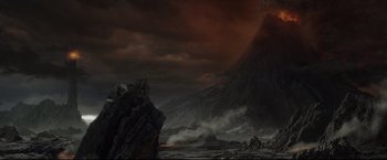 Movie still from “The Lord of the Rings: The Return of the King” (2003), directed by Peter Jackson – An image of an image of a volcano in the middle of the night; Extreme Wide shot, High angle