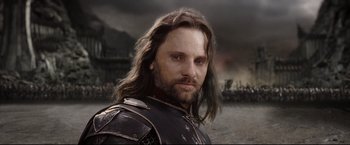 Movie still from “The Lord of the Rings: The Return of the King” (2003), directed by Peter Jackson – A person wearing a costume; Close Up shot, Low angle