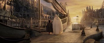 Movie still from “The Lord of the Rings: The Return of the King” (2003), directed by Peter Jackson – A couple of people standing next to each other on top of a boat; Wide shot, High angle