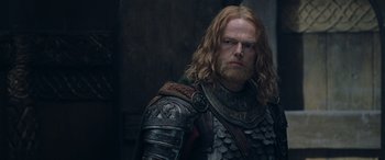 Movie still from “The Lord of the Rings: The Two Towers” (2002), directed by Peter Jackson – A person wearing a costume; Close Up shot, Over the shoulder angle