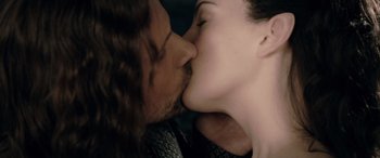 Movie still from “The Lord of the Rings: The Two Towers” (2002), directed by Peter Jackson – A person kissing another person's face; Close Up shot, High angle