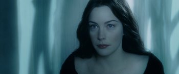 Movie still from “The Lord of the Rings: The Two Towers” (2002), directed by Peter Jackson – A person with long black hair; Close Up shot, Over the shoulder angle