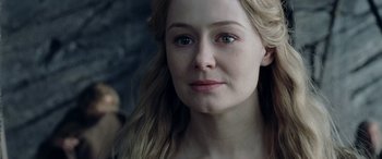 Movie still from “The Lord of the Rings: The Two Towers” (2002), directed by Peter Jackson – A person with long blonde hair; Close Up shot, Over the shoulder angle