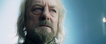 Movie still from “The Lord of the Rings: The Two Towers” (2002), directed by Peter Jackson – A man with a beard and mustache; Close Up shot, Low angle