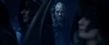 Movie still from “The Lord of the Rings: The Two Towers” (2002), directed by Peter Jackson – A man with long hair is looking into a mirror; Close Up shot, Over the shoulder angle