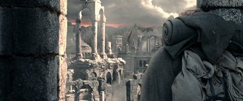 Movie still from “The Lord of the Rings: The Two Towers” (2002), directed by Peter Jackson – An image of an ancient city in the middle of the day; Close Up shot, Low angle