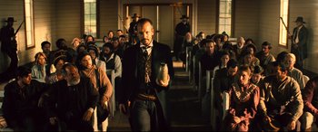 Movie still from “The Magnificent Seven” (2016), directed by Antoine Fuqua – Medium shot, Low angle