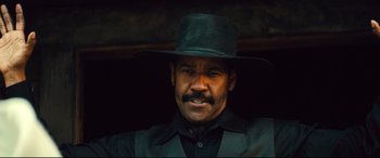 Movie still from “The Magnificent Seven” (2016), directed by Antoine Fuqua – Close Up shot, Low angle