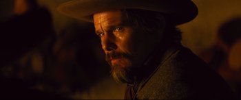 Movie still from “The Magnificent Seven” (2016), directed by Antoine Fuqua – Close Up shot, Over the shoulder angle