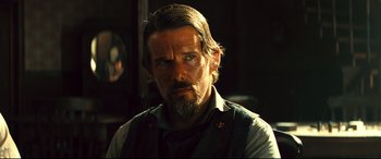 Movie still from “The Magnificent Seven” (2016), directed by Antoine Fuqua – Close Up shot, Over the shoulder angle