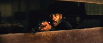 Movie still from “The Magnificent Seven” (2016), directed by Antoine Fuqua – Close Up shot, Low angle