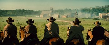Movie still from “The Magnificent Seven” (2016), directed by Antoine Fuqua – Wide shot, Low angle