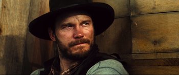 Movie still from “The Magnificent Seven” (2016), directed by Antoine Fuqua – Close Up shot, Over the shoulder angle