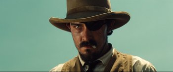 Movie still from “The Magnificent Seven” (2016), directed by Antoine Fuqua – Close Up shot, Low angle