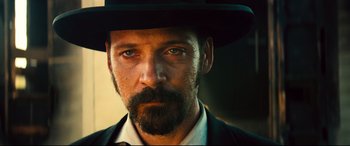 Movie still from “The Magnificent Seven” (2016), directed by Antoine Fuqua – Close Up shot, Low angle