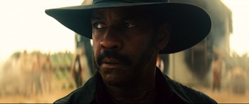 Movie still from “The Magnificent Seven” (2016), directed by Antoine Fuqua – Close Up shot, Over the shoulder angle