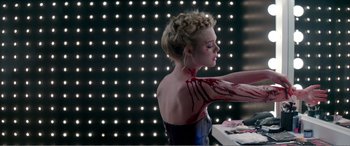 Movie still from “The Neon Demon” (2016), directed by Nicolas Winding Refn – Medium shot, Low angle