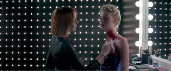 Movie still from “The Neon Demon” (2016), directed by Nicolas Winding Refn – Close Up shot, Over the shoulder angle