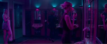 Movie still from “The Neon Demon” (2016), directed by Nicolas Winding Refn – Medium shot, Over the shoulder angle