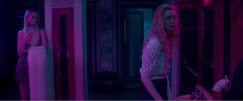 Movie still from “The Neon Demon” (2016), directed by Nicolas Winding Refn – Medium shot, Over the shoulder angle