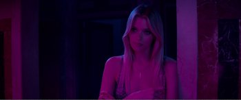 Movie still from “The Neon Demon” (2016), directed by Nicolas Winding Refn – Medium shot, Over the shoulder angle