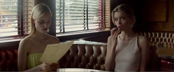 Movie still from “The Neon Demon” (2016), directed by Nicolas Winding Refn – Medium shot, Over the shoulder angle