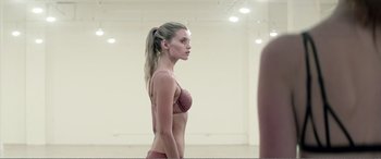 Movie still from “The Neon Demon” (2016), directed by Nicolas Winding Refn – Medium shot, Over the shoulder angle