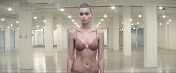 Movie still from “The Neon Demon” (2016), directed by Nicolas Winding Refn – Medium shot, Low angle