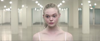 Movie still from “The Neon Demon” (2016), directed by Nicolas Winding Refn – Close Up shot, Over the shoulder angle
