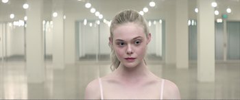 Movie still from “The Neon Demon” (2016), directed by Nicolas Winding Refn – Close Up shot, Over the shoulder angle