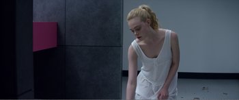 Movie still from “The Neon Demon” (2016), directed by Nicolas Winding Refn – Medium shot, Over the shoulder angle