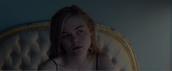 Movie still from “The Neon Demon” (2016), directed by Nicolas Winding Refn – Close Up shot, Over the shoulder angle