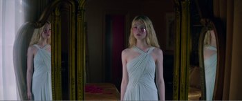 Movie still from “The Neon Demon” (2016), directed by Nicolas Winding Refn – Medium shot, Low angle