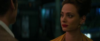 Movie still from “The Offer” (2022), directed by Dexter Fletcher – A person wearing a yellow shirt; Close Up shot, Over the shoulder angle