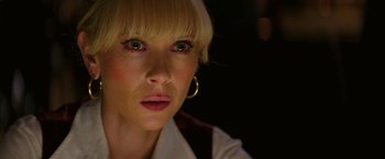 Movie still from “The Offer” (2022), directed by Dexter Fletcher – A person with short blonde hair; Close Up shot, Over the shoulder angle